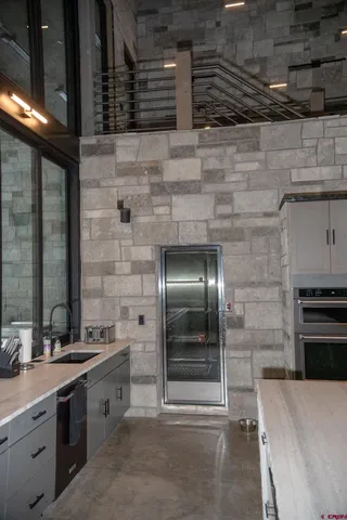 a bathroom with a sink and a shower