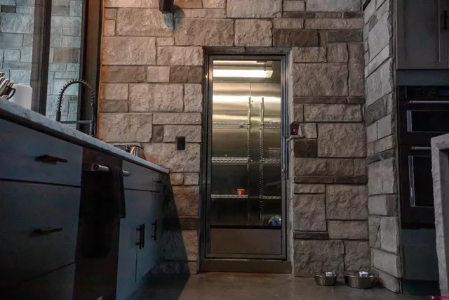a view of balcony with furniture and garden