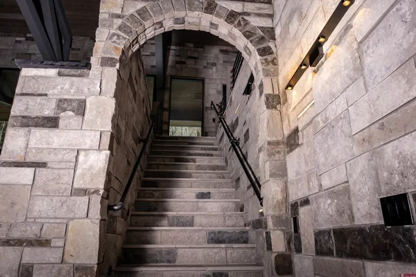 a kitchen with a sink and a counter top space
