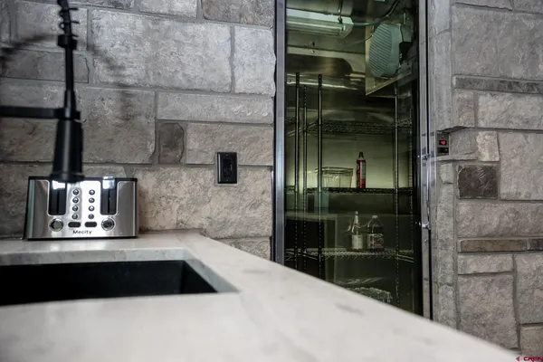 a bathroom with a sink and a shower