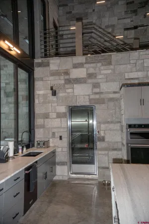 a kitchen with a stove and a sink