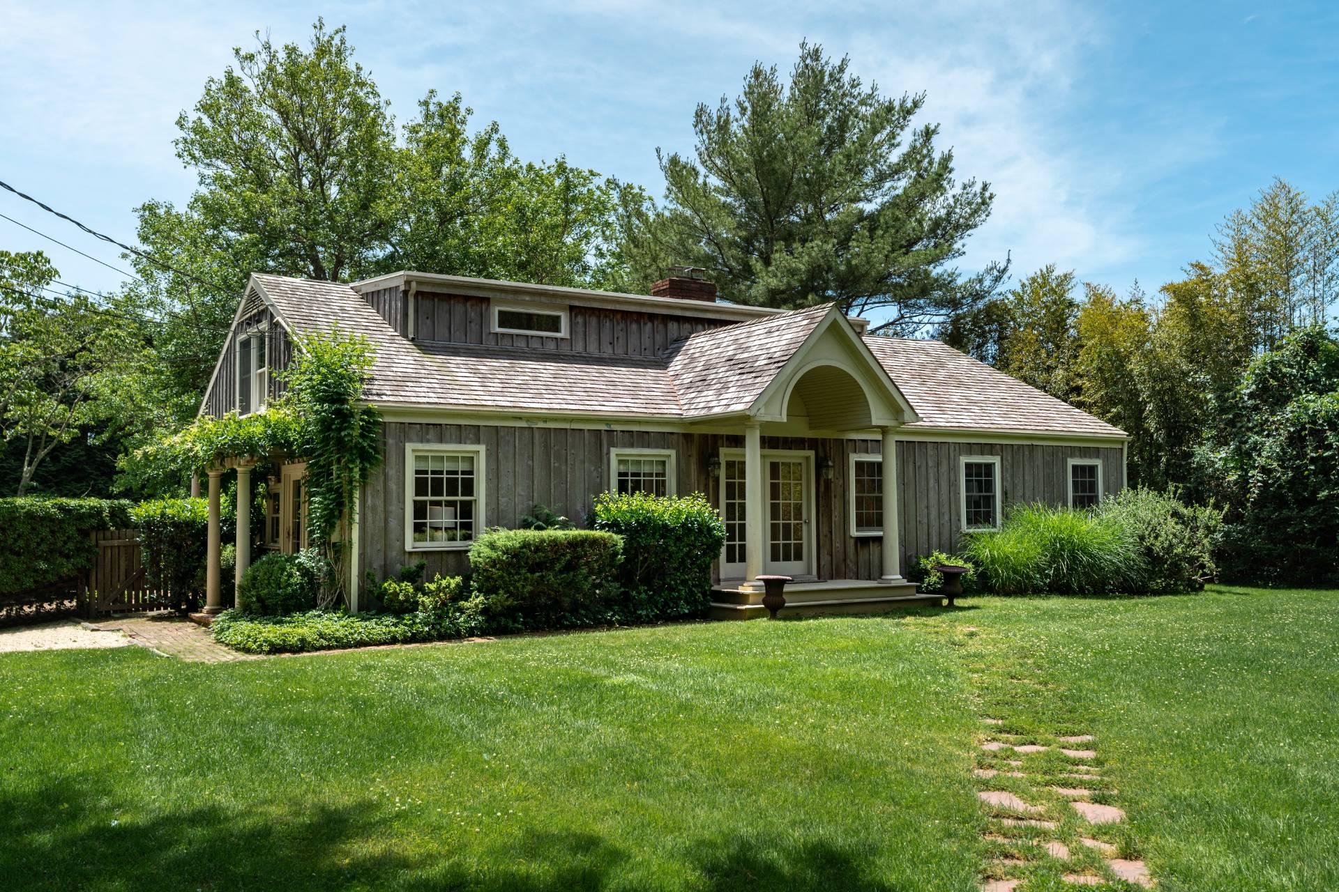 53 Hildreth Lane Bridgehampton, NY 11932 - Photo 2 of 37 a front view of house with yard and green space
