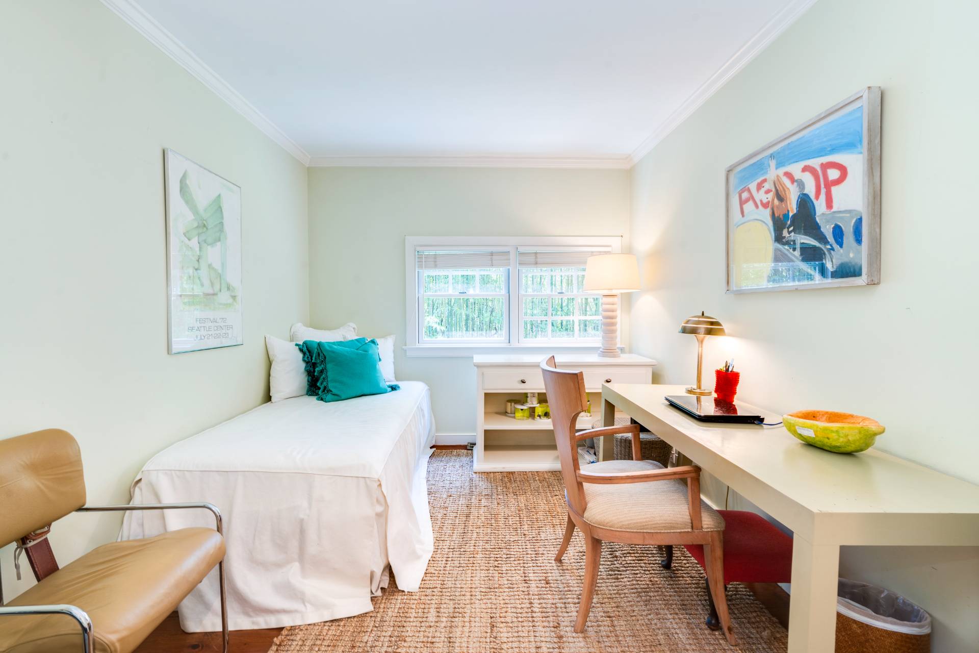 53 Hildreth Lane Bridgehampton, NY 11932 - Photo 30 of 37 a bedroom with a bed and a table in it with wooden floor