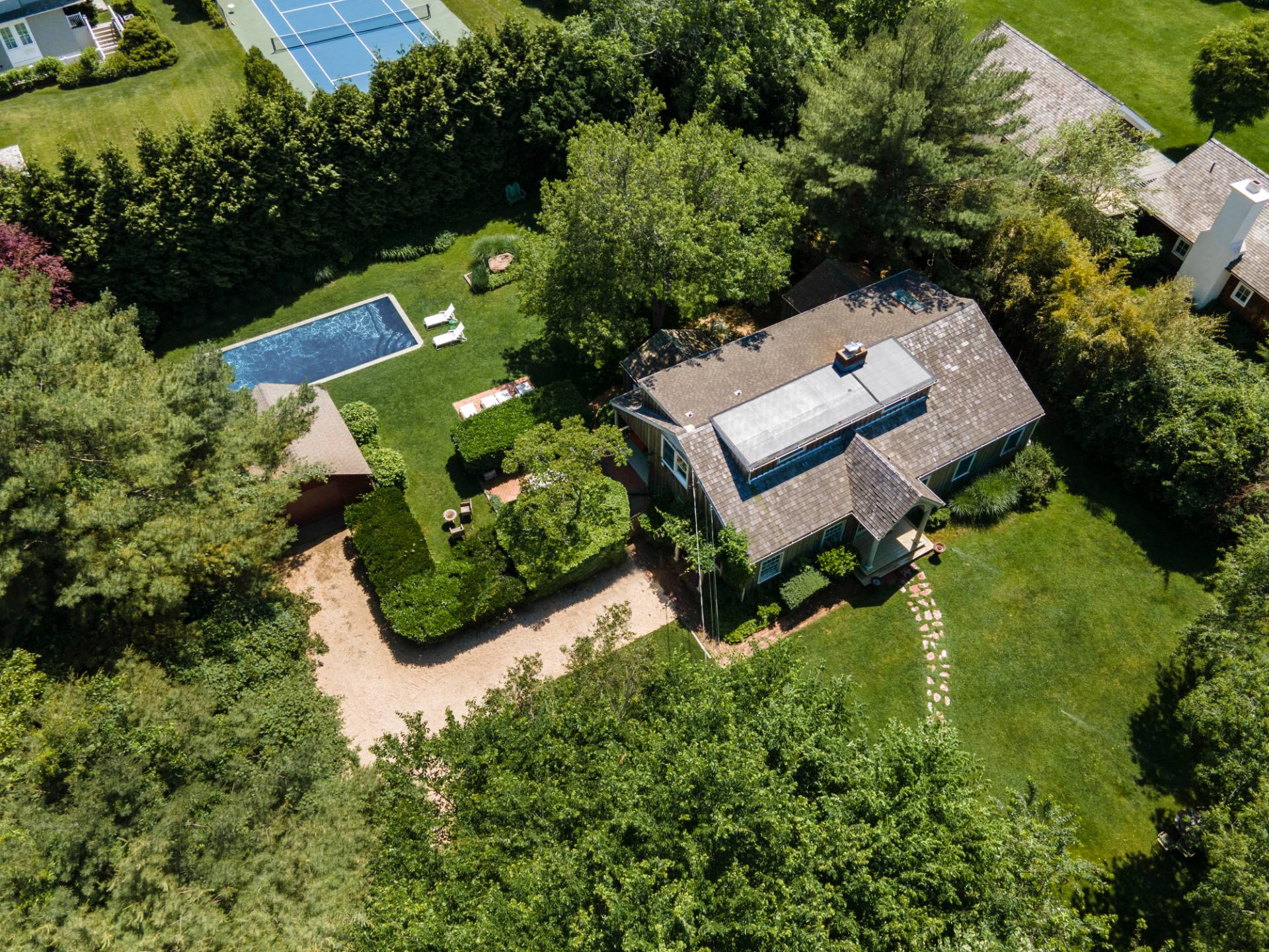 53 Hildreth Lane Bridgehampton, NY 11932 - Photo 36 of 37 an aerial view of a house with a yard and lake view