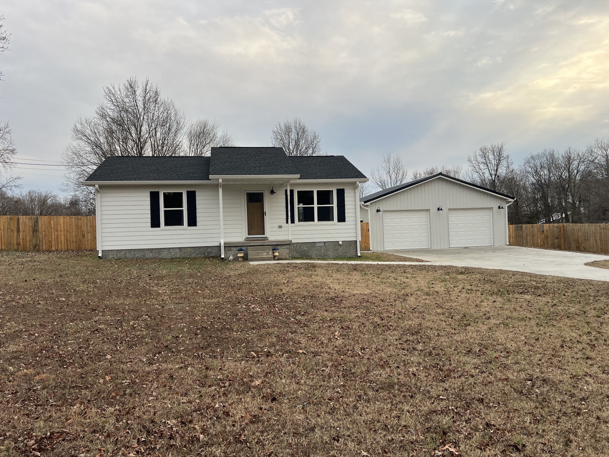 front view of a house with a dry yard