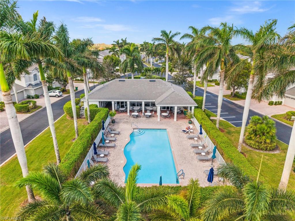 6080 Pinnacle Lane, Unit 1701 Naples, FL 34110 - Photo 37 of 39 an aerial view of a house with swimming pool garden and patio