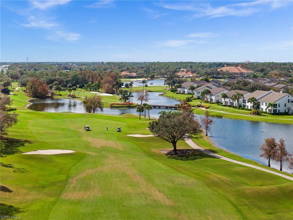 6080 Pinnacle Lane, Unit 1701 Naples, FL 34110 - Photo 38 of 39 a view of a lake with a city