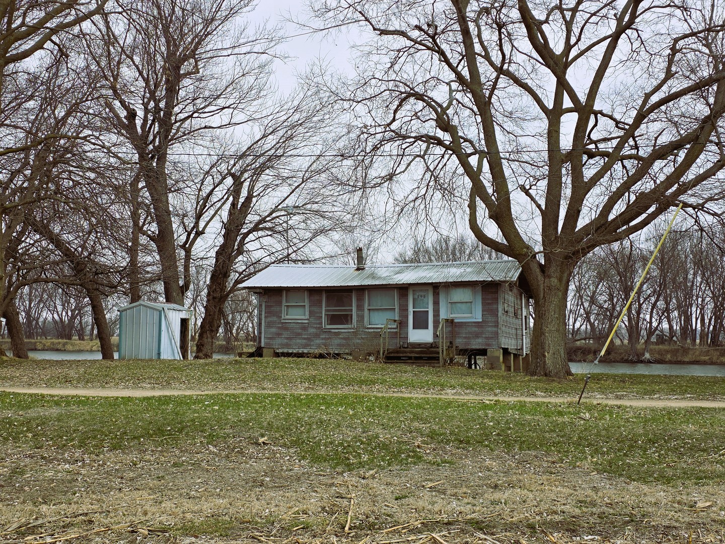 13420 Howard Road Prophetstown, IL 61277 - Photo 7 of 16 a view of house with a yard