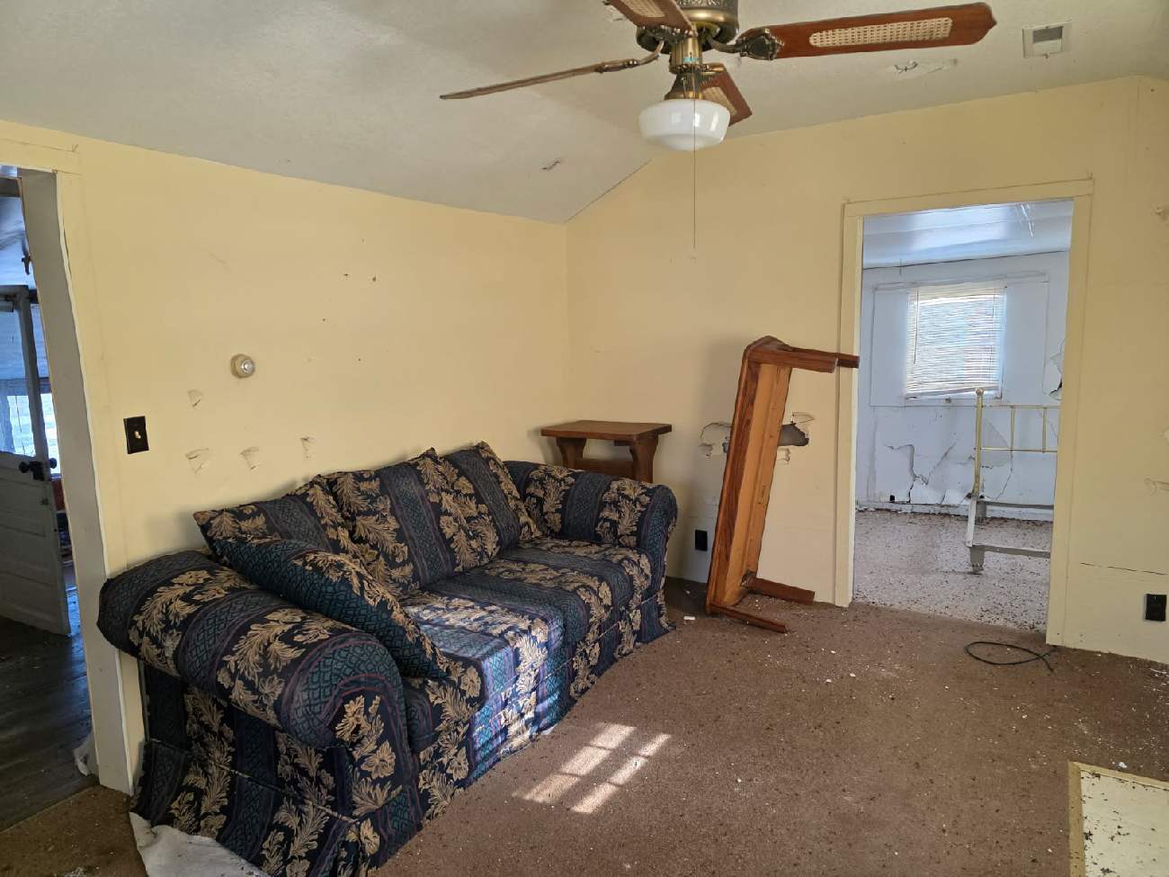 13420 Howard Road Prophetstown, IL 61277 - Photo 10 of 16 a living room with a couch and a chandelier