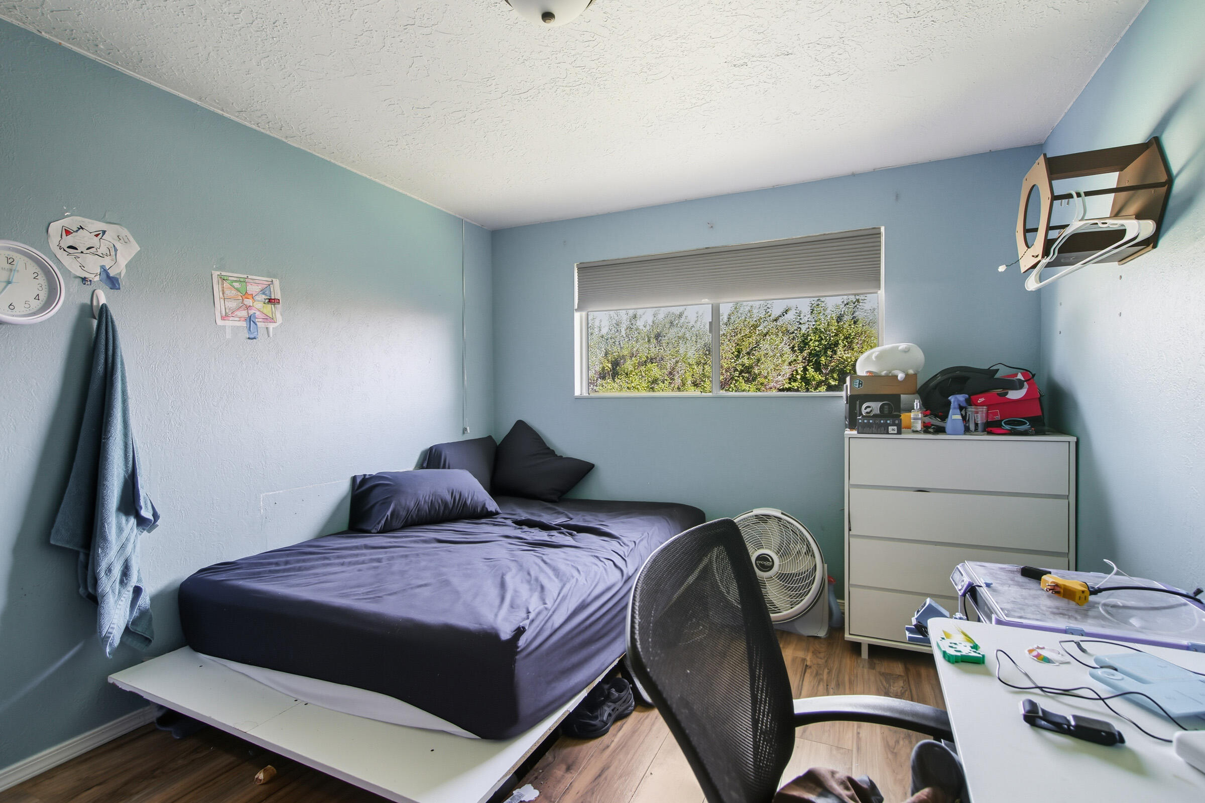 664 Southwest 35th Street Redmond, OR 97756 - Photo 15 of 19 a bedroom with a bed and a window
