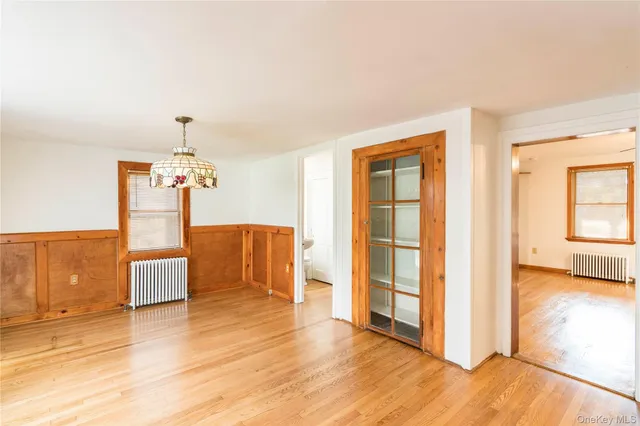 a large kitchen with stainless steel appliances granite countertop a stove a sink dishwasher and a refrigerator