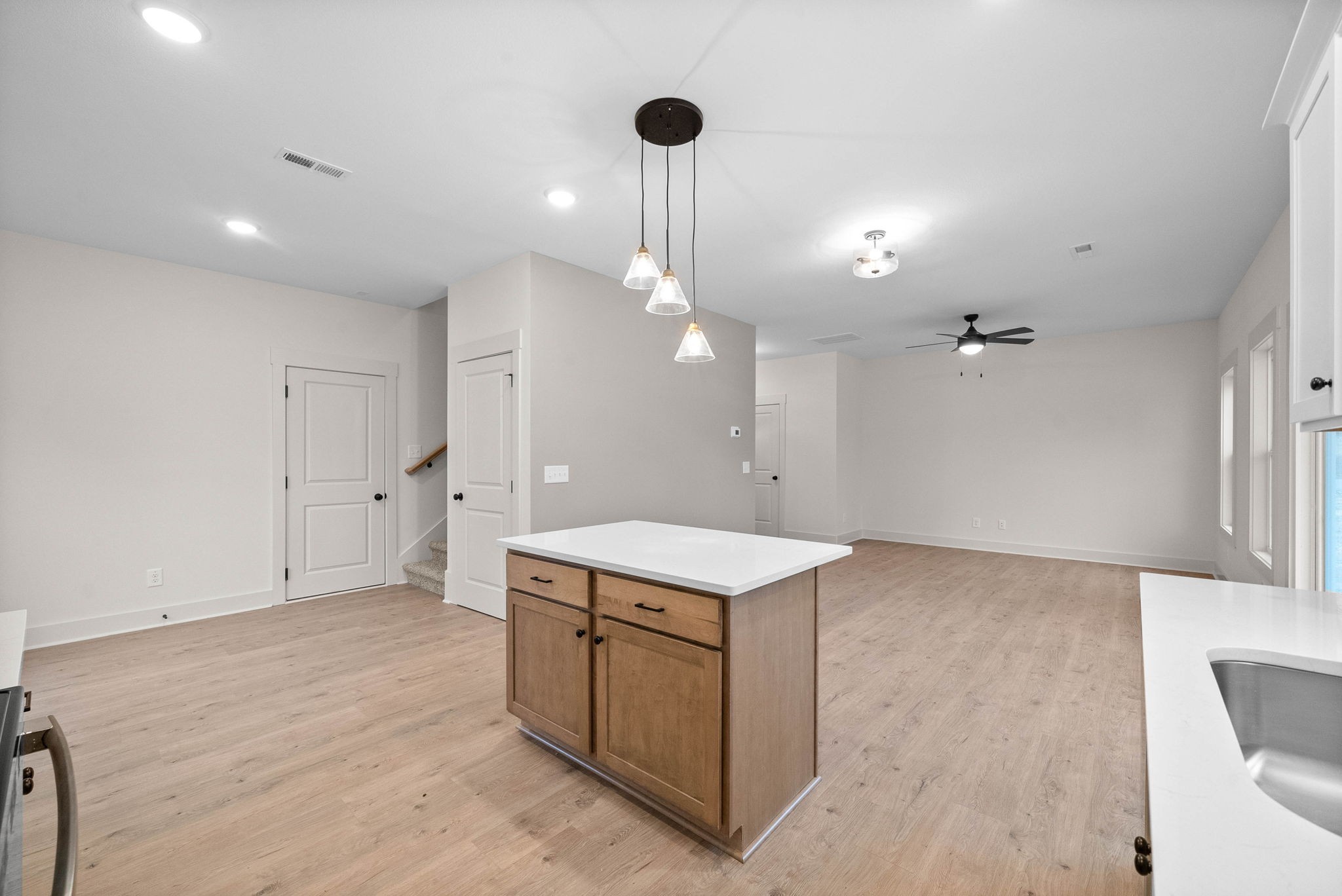 193 Dewberry Road Clarksville, TN 37042 - Photo 13 of 30 a kitchen that has a sink a stove and a refrigerator