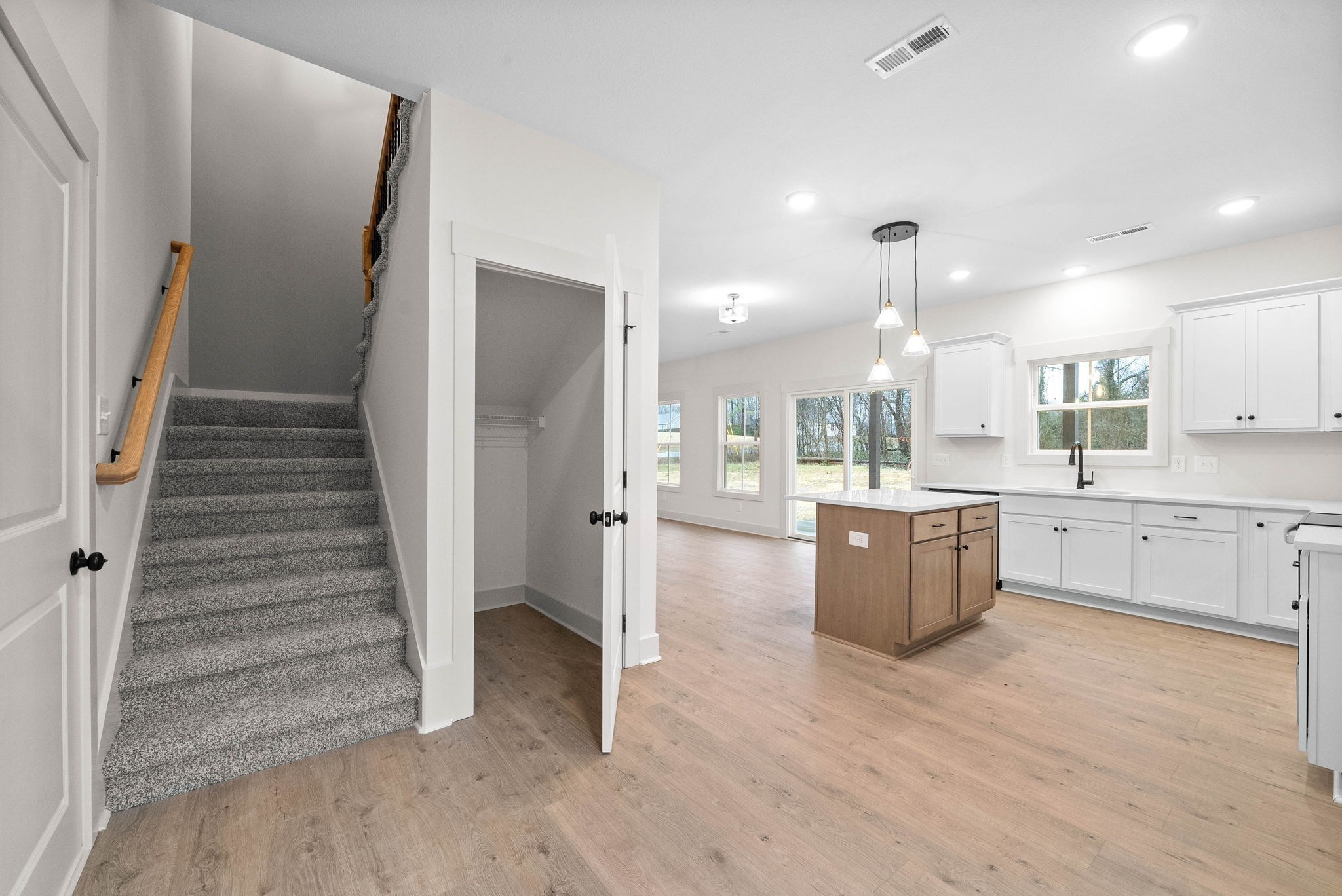 193 Dewberry Road Clarksville, TN 37042 - Photo 14 of 30 a view of kitchen with sink microwave and refrigerator