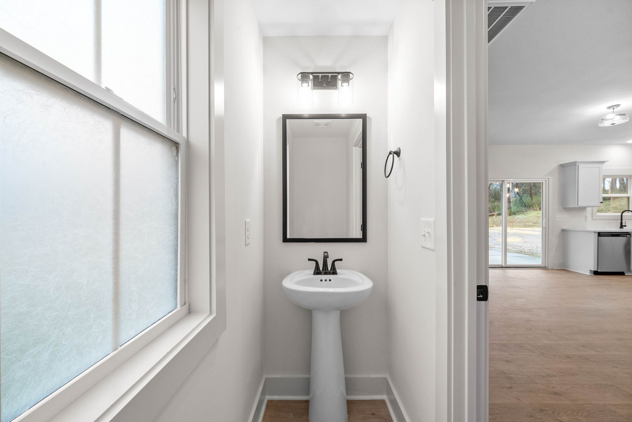 193 Dewberry Road Clarksville, TN 37042 - Photo 15 of 30 a bathroom with a sink and a mirror