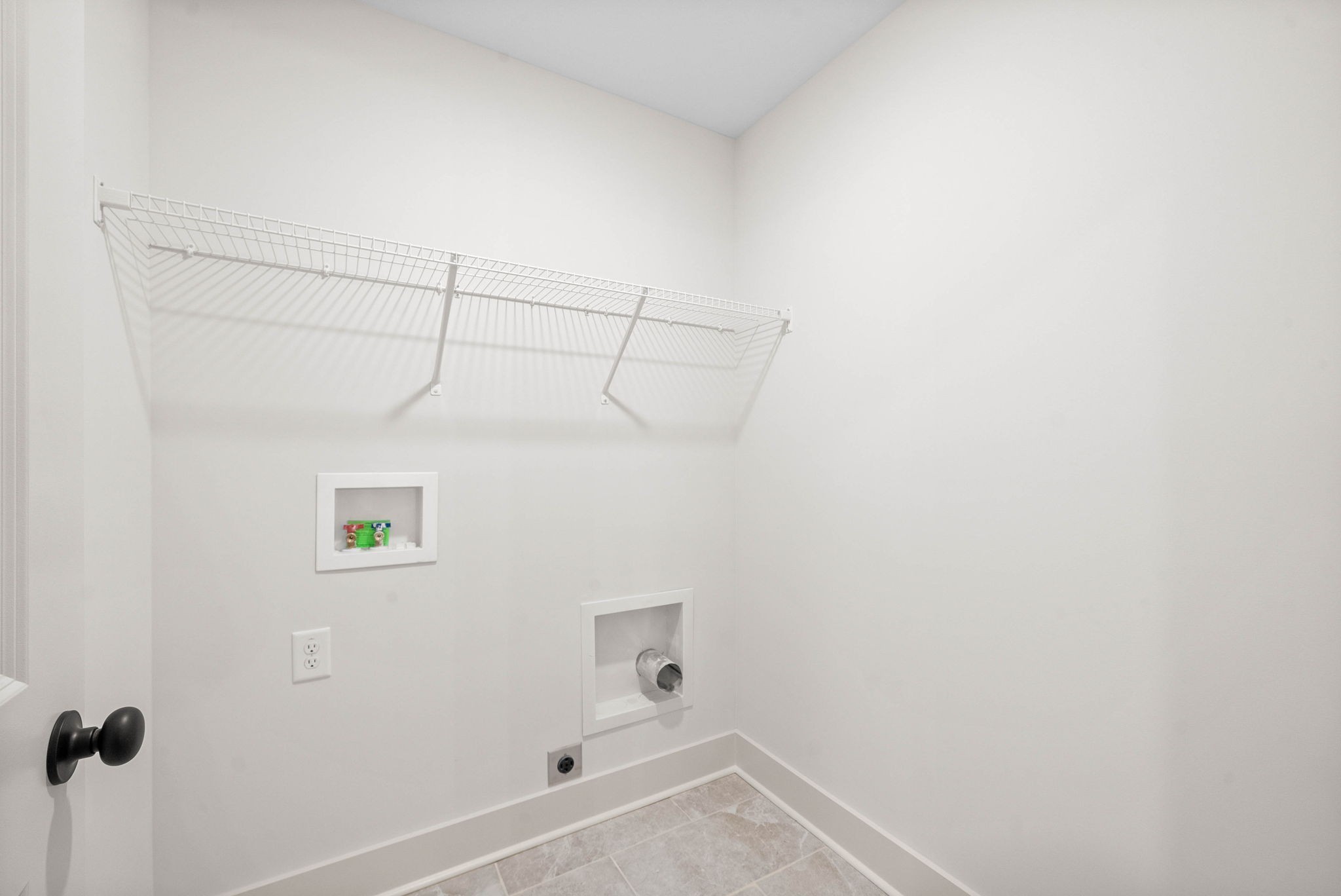 193 Dewberry Road Clarksville, TN 37042 - Photo 17 of 30 a view of a room with racks on the wall