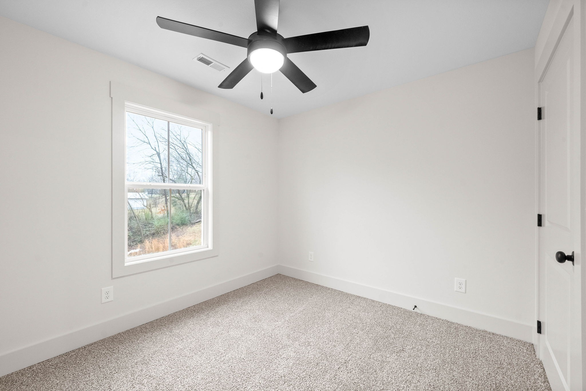 193 Dewberry Road Clarksville, TN 37042 - Photo 24 of 30 an empty room with a window and a fan