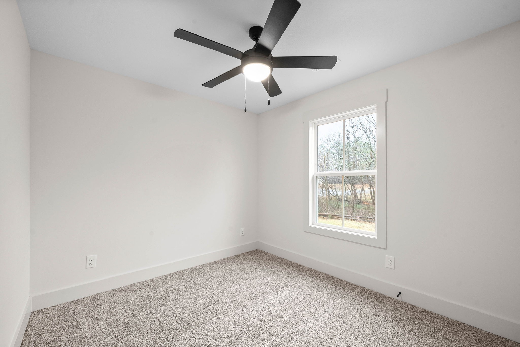 193 Dewberry Road Clarksville, TN 37042 - Photo 26 of 30 an empty room with a window and a fan