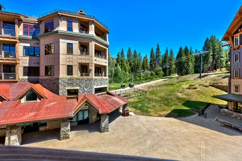 a front view of a house with swimming pool