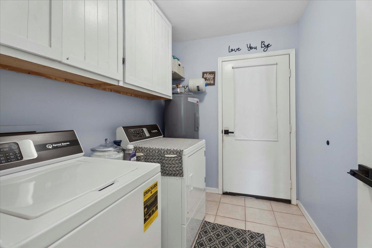 536 Moultrie Wells Road St. Augustine, FL 32086 - Photo 27 of 40 a utility room with dryer and washer