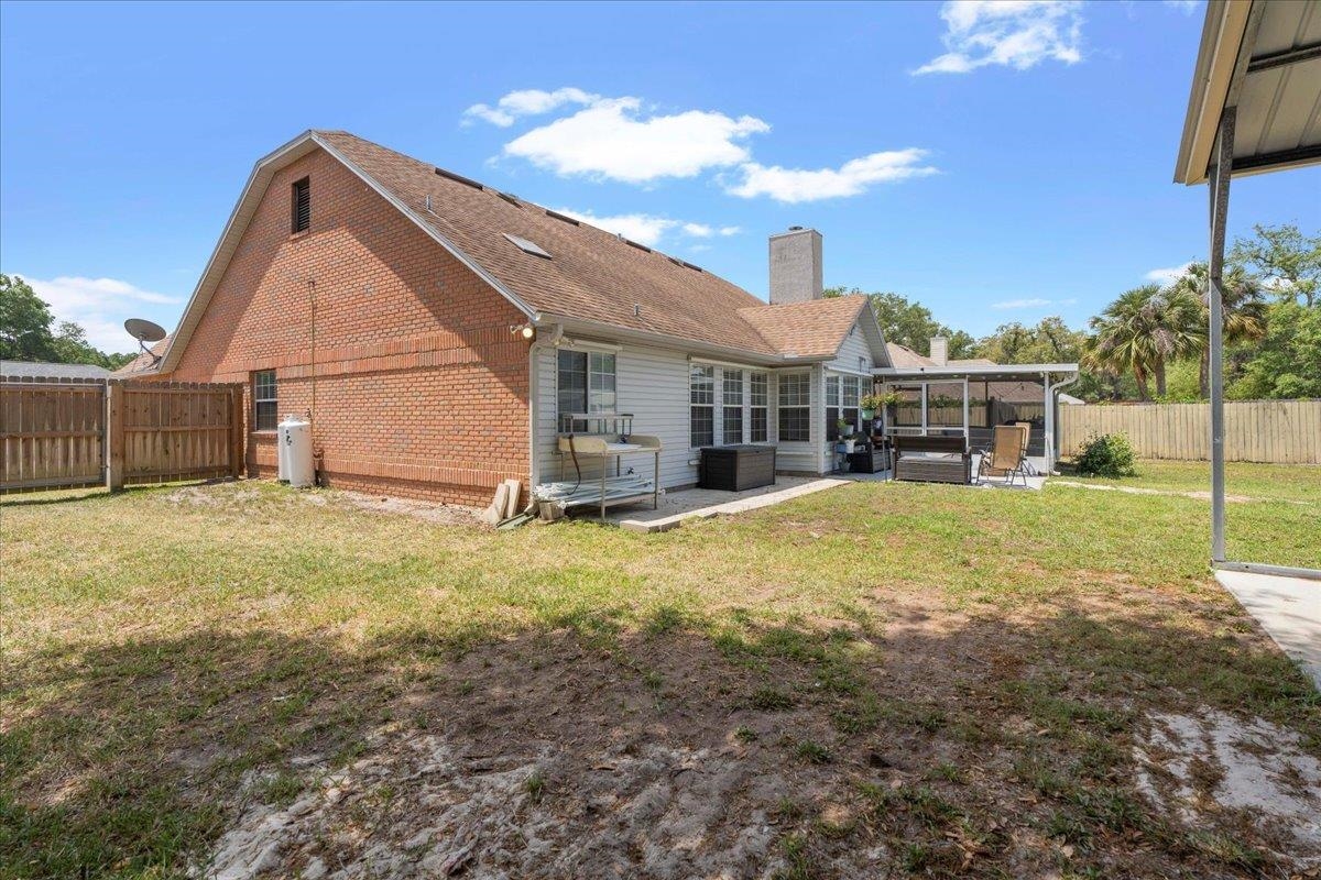536 Moultrie Wells Road St. Augustine, FL 32086 - Photo 32 of 40 a house view with a outdoor space