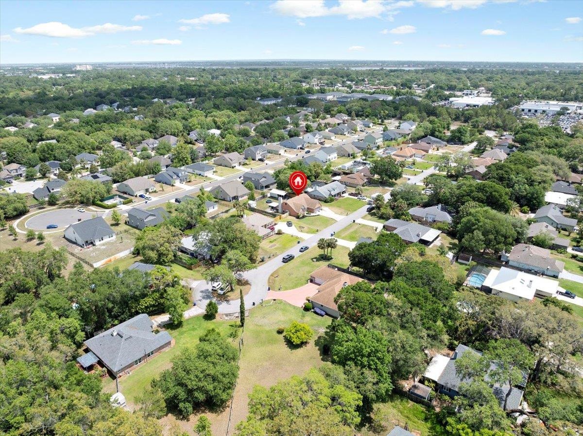 536 Moultrie Wells Road St. Augustine, FL 32086 - Photo 40 of 40 an aerial view of residential houses with outdoor space