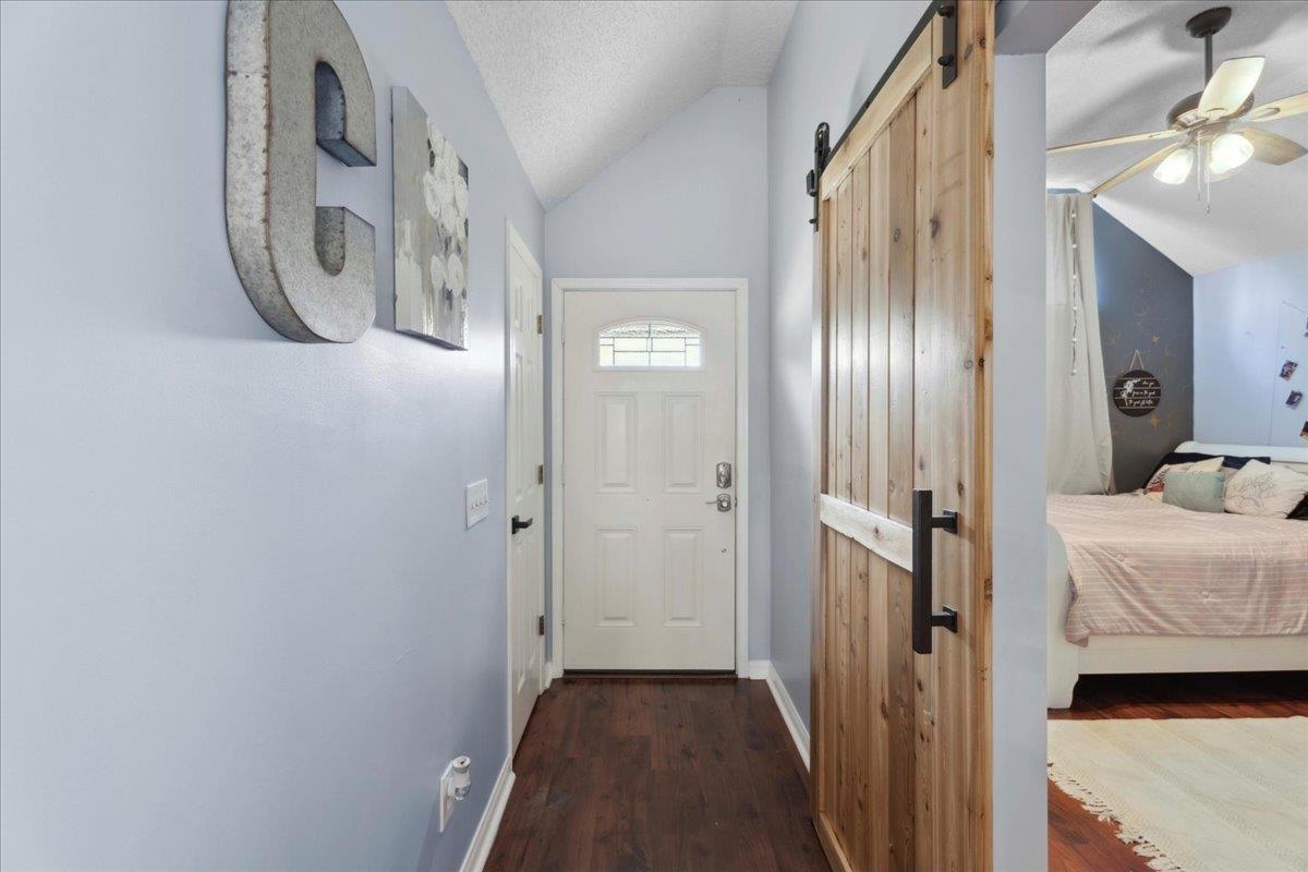 536 Moultrie Wells Road St. Augustine, FL 32086 - Photo 4 of 40 a view of a hallway with windows and closet