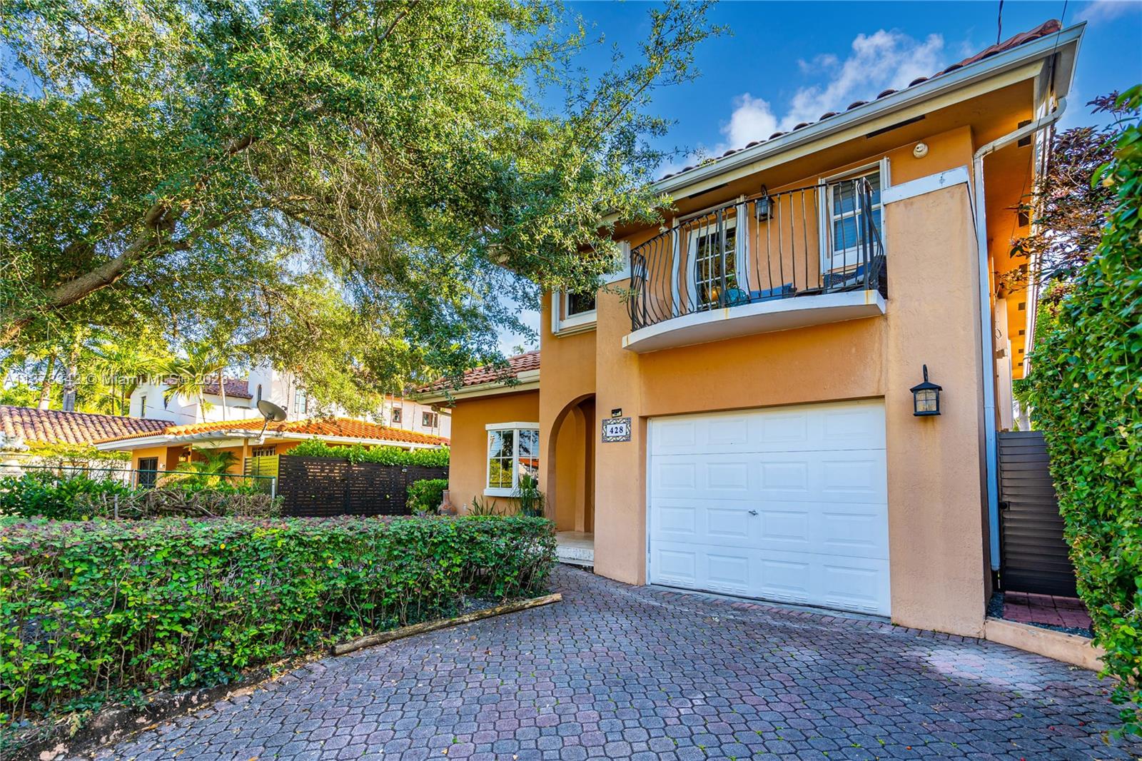 428 Southwest 19th Road Miami, FL 33129 - Photo 3 of 38 front view of a house with a yard