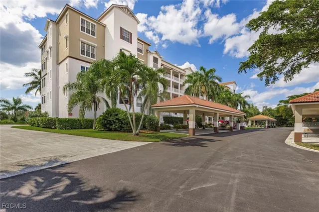 a view of a building with a yard