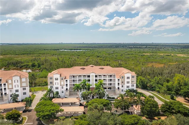 a view of a city with a lake