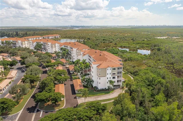 a view of city with ocean