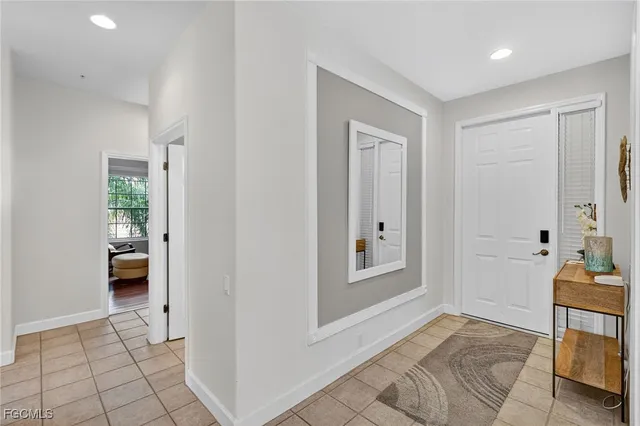 a view of livingroom with furniture and front door
