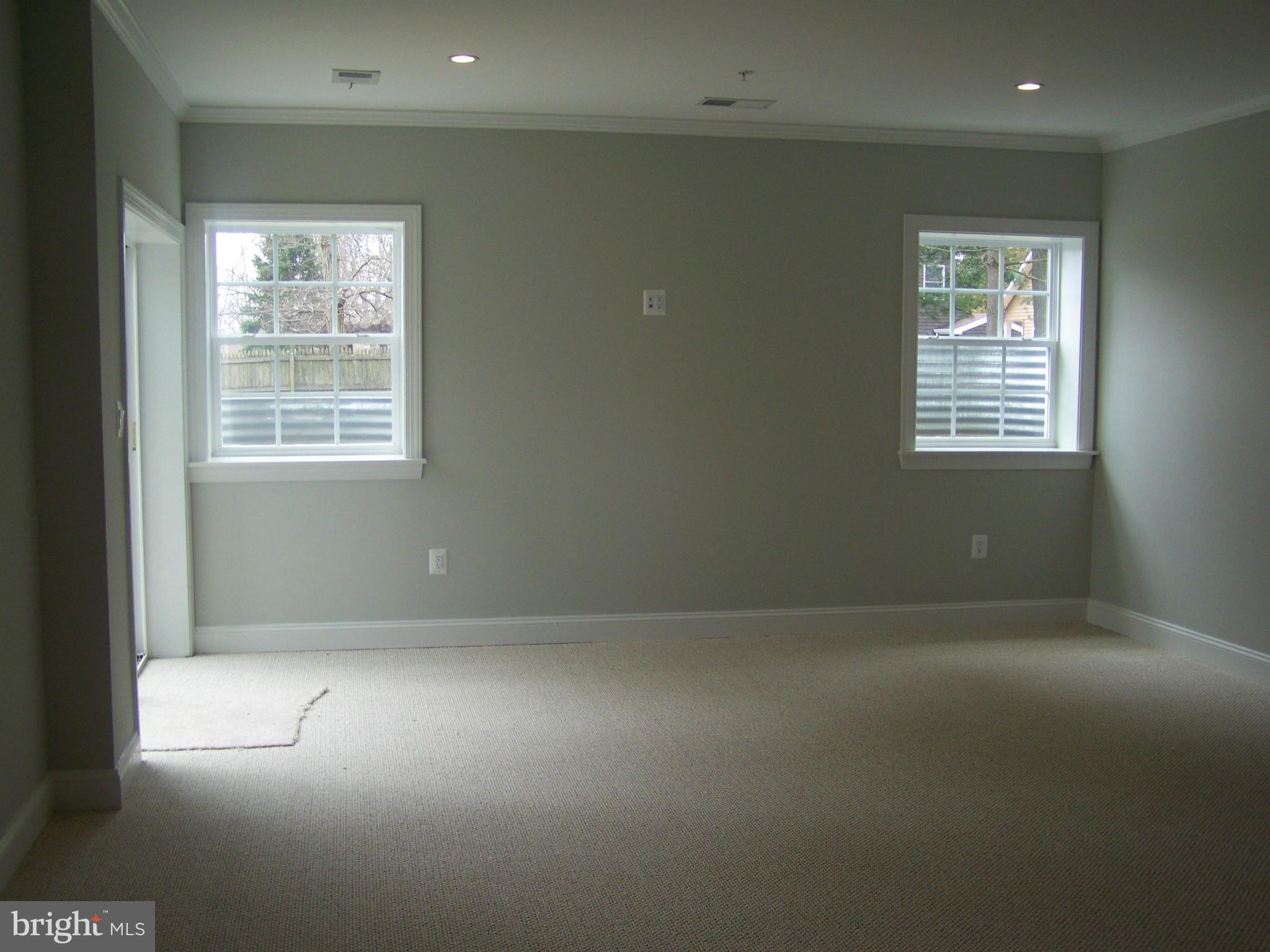 4324 Holly Ridge Road Rockville, MD 20853 - Photo 15 of 16 a view of an empty room with a window