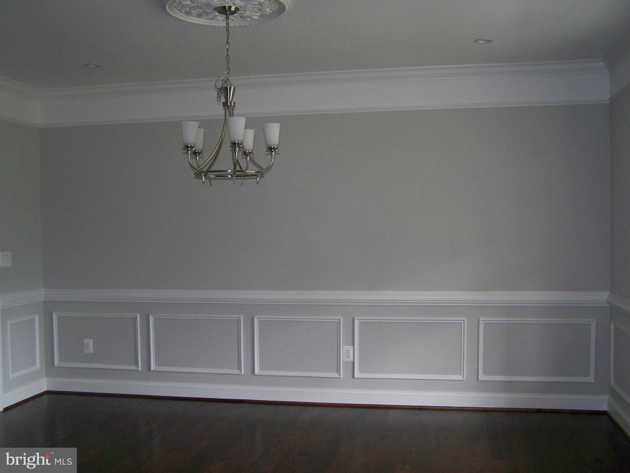 4324 Holly Ridge Road Rockville, MD 20853 - Photo 4 of 16 a white cabinet with white walls