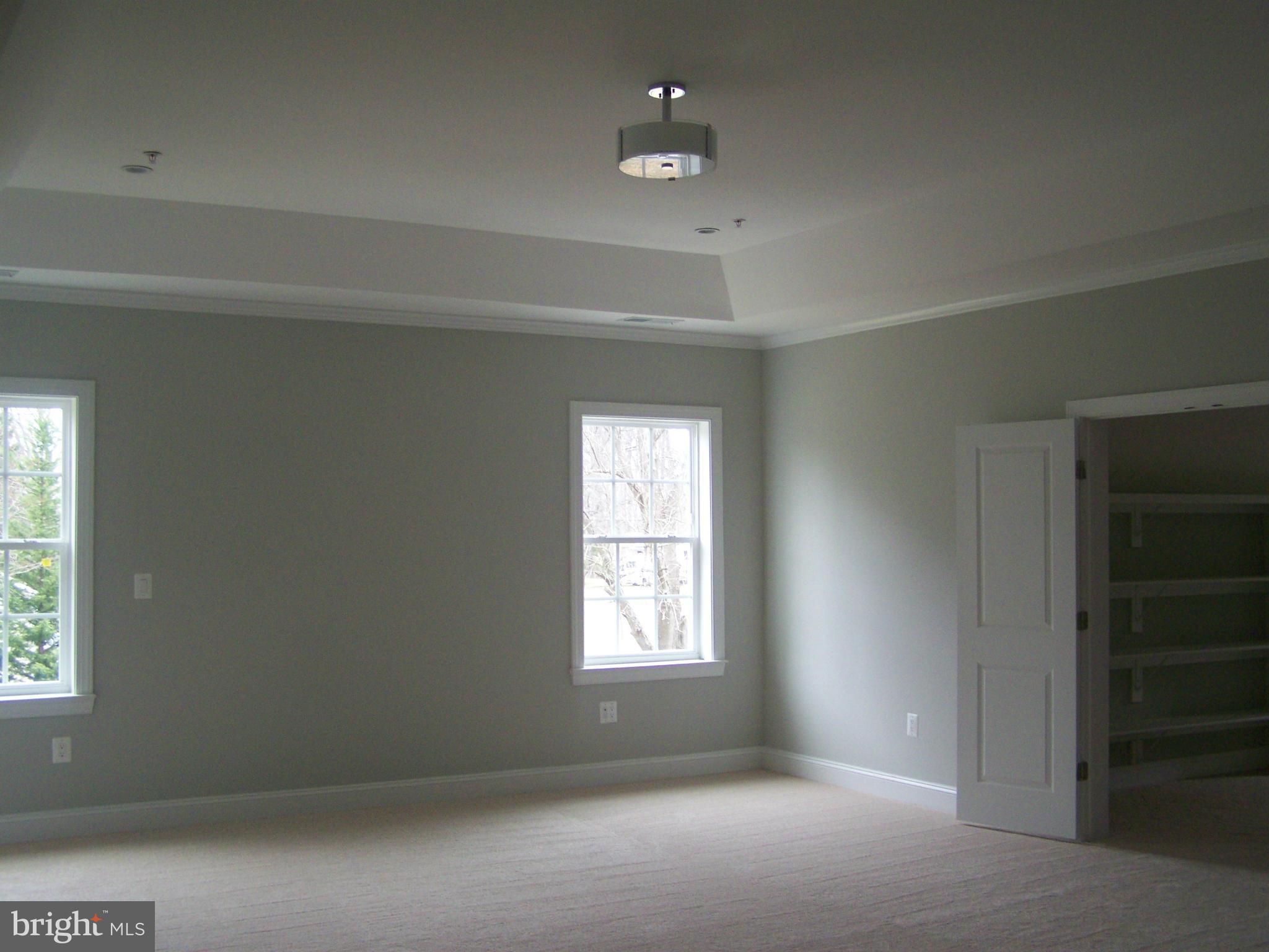4324 Holly Ridge Road Rockville, MD 20853 - Photo 8 of 16 an empty room with windows