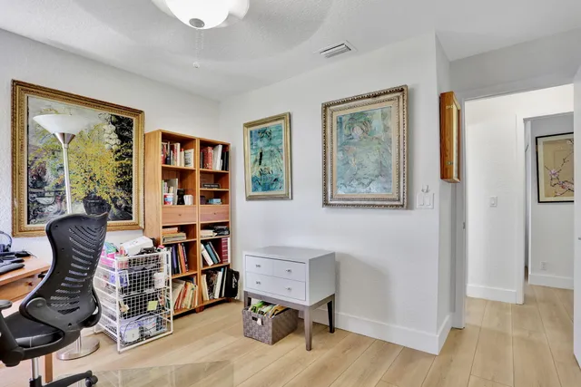 a room with furniture and a book shelf