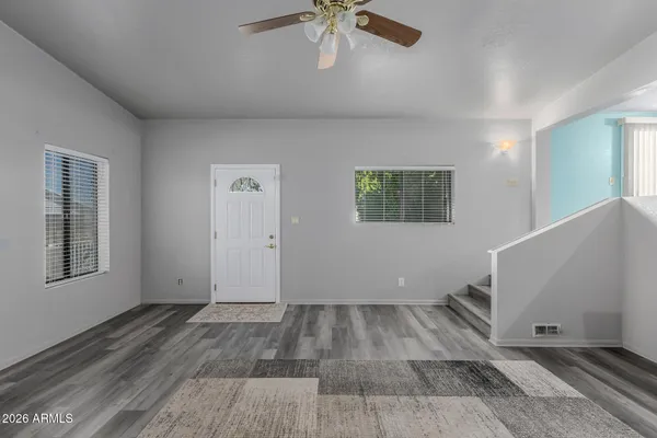 a view of empty room with windows