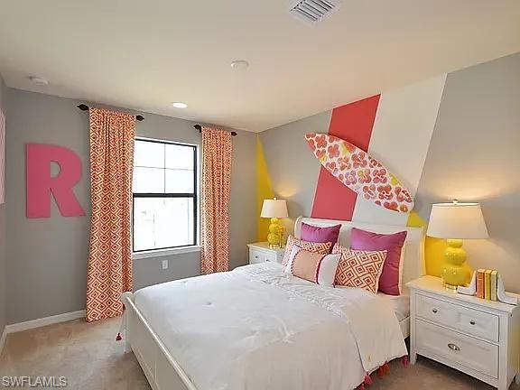 4085 Spotted Eagle Way Fort Myers, FL 33966 - Photo 4 of 12 a bedroom with a bed and a window