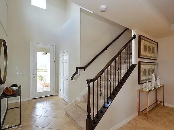 4085 Spotted Eagle Way Fort Myers, FL 33966 - Photo 6 of 12 a view of an entryway with wooden floor and windows
