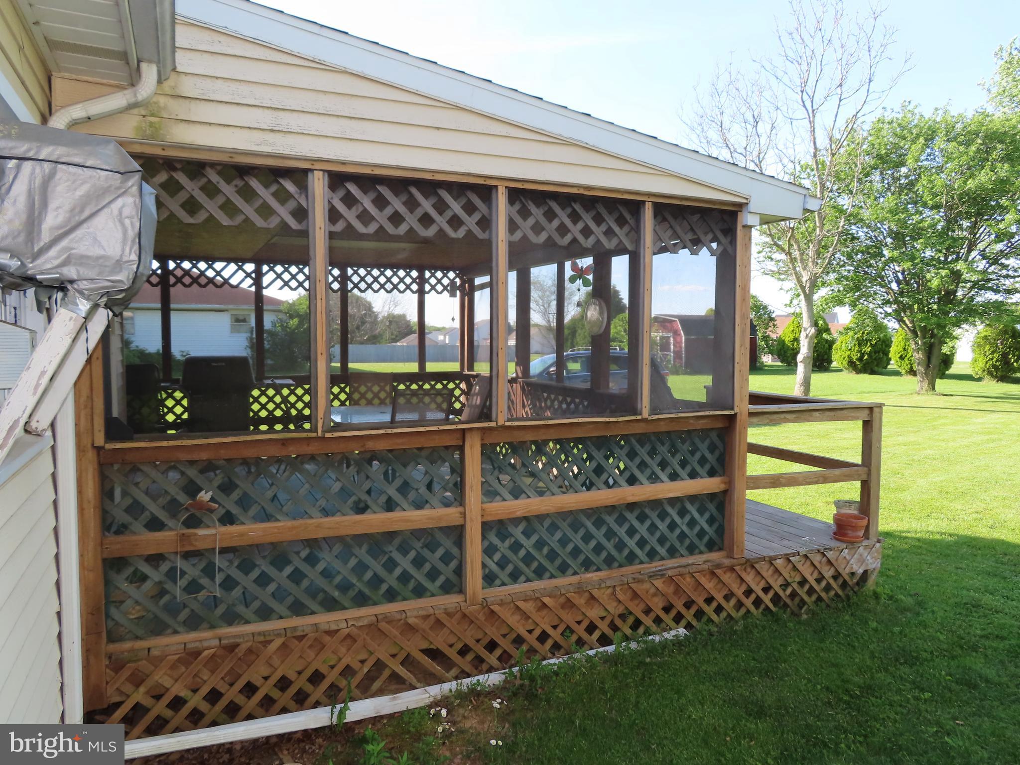 3338 Centennial Road Hanover, PA 17331 - Photo 11 of 30 a view of a porch with a bench