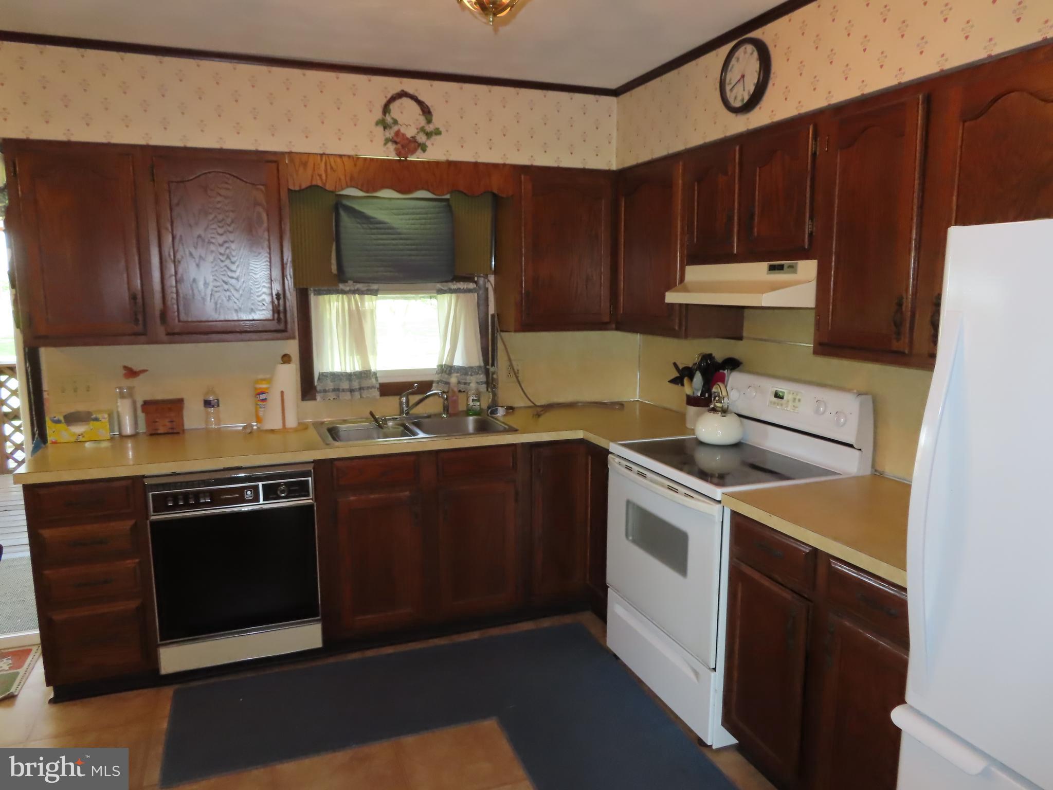 3338 Centennial Road Hanover, PA 17331 - Photo 14 of 30 a kitchen with a sink and a stove