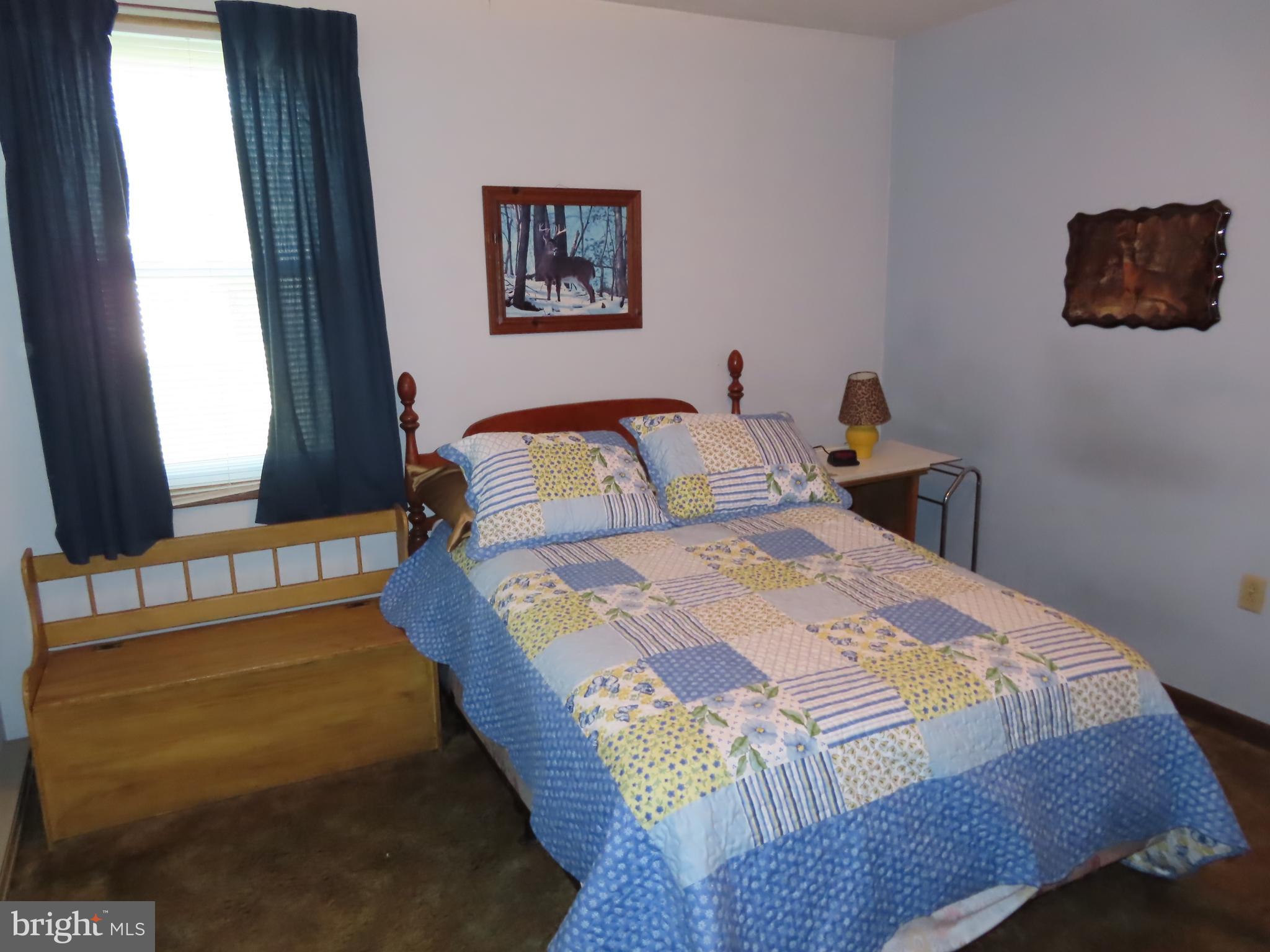 3338 Centennial Road Hanover, PA 17331 - Photo 16 of 30 a bedroom with a bed and a window