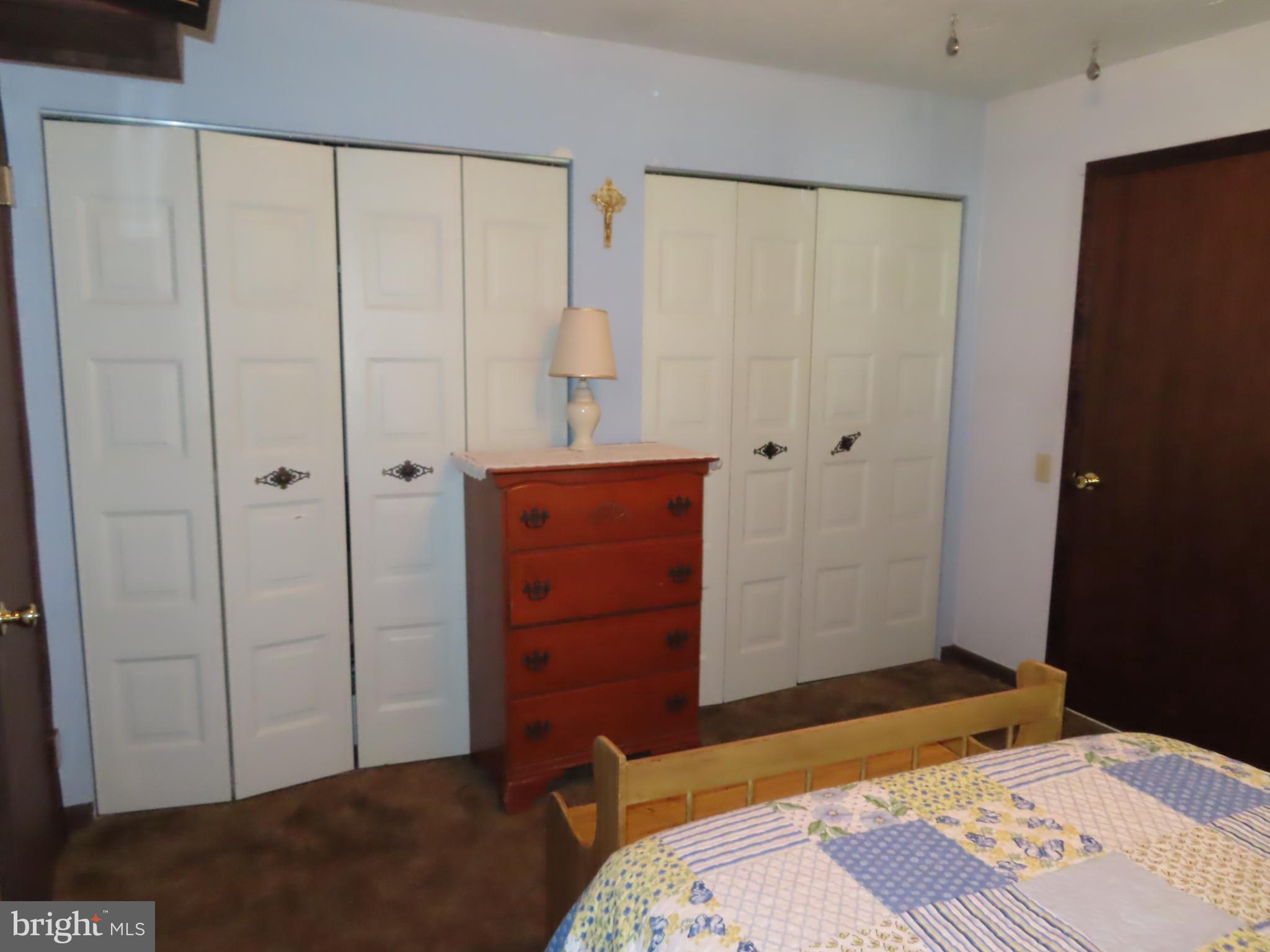 3338 Centennial Road Hanover, PA 17331 - Photo 18 of 30 a bedroom with a bed and a dresser