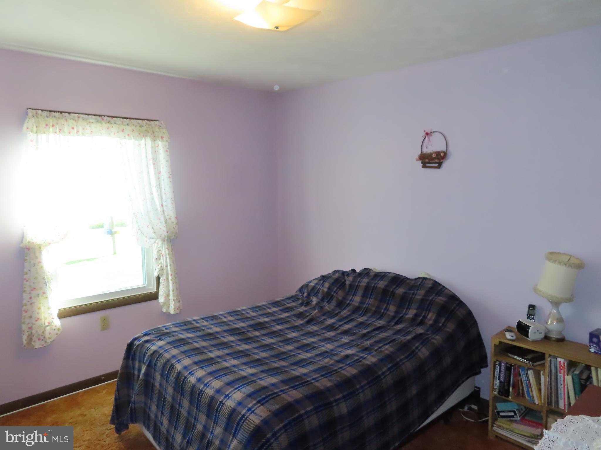 3338 Centennial Road Hanover, PA 17331 - Photo 25 of 30 a bedroom with a bed and a window