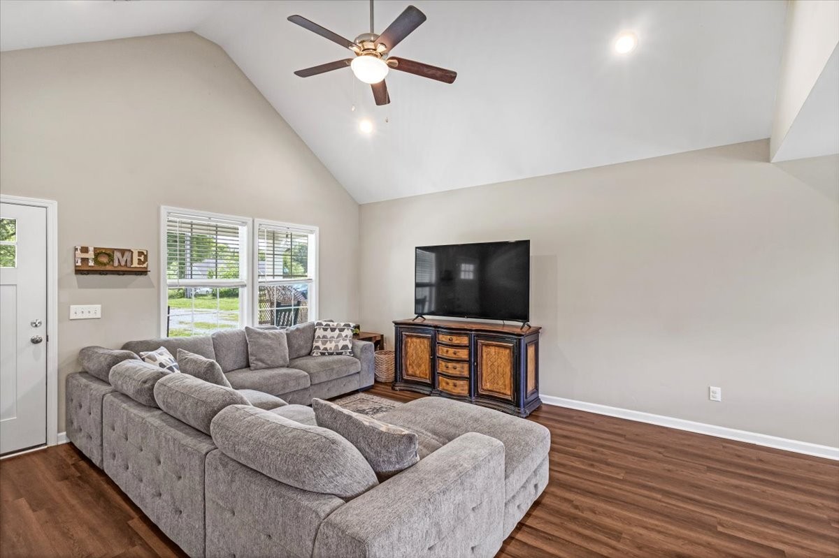147 Ray Jent Road Bethpage, TN 37022 - Photo 12 of 47 a living room with furniture and a flat screen tv