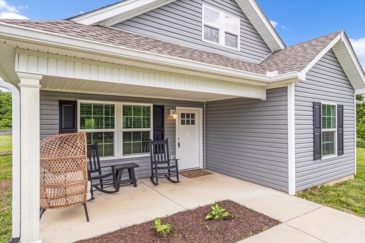 147 Ray Jent Road Bethpage, TN 37022 - Photo 2 of 47 a backyard of a house with seating space