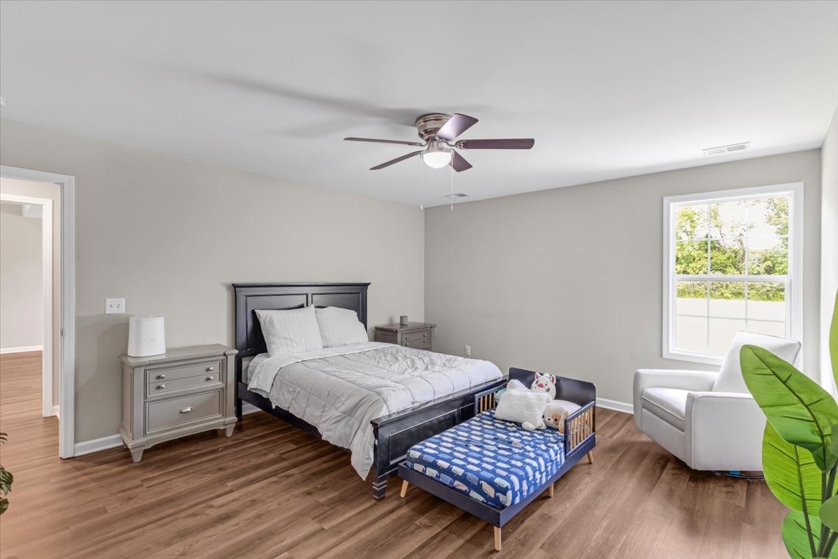 147 Ray Jent Road Bethpage, TN 37022 - Photo 24 of 47 a bedroom with a bed furniture and a window