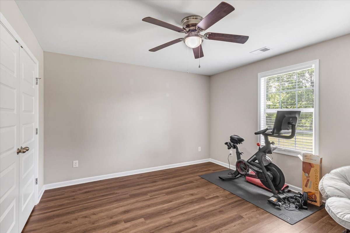 147 Ray Jent Road Bethpage, TN 37022 - Photo 28 of 47 a view of a room with gym equipment and windows