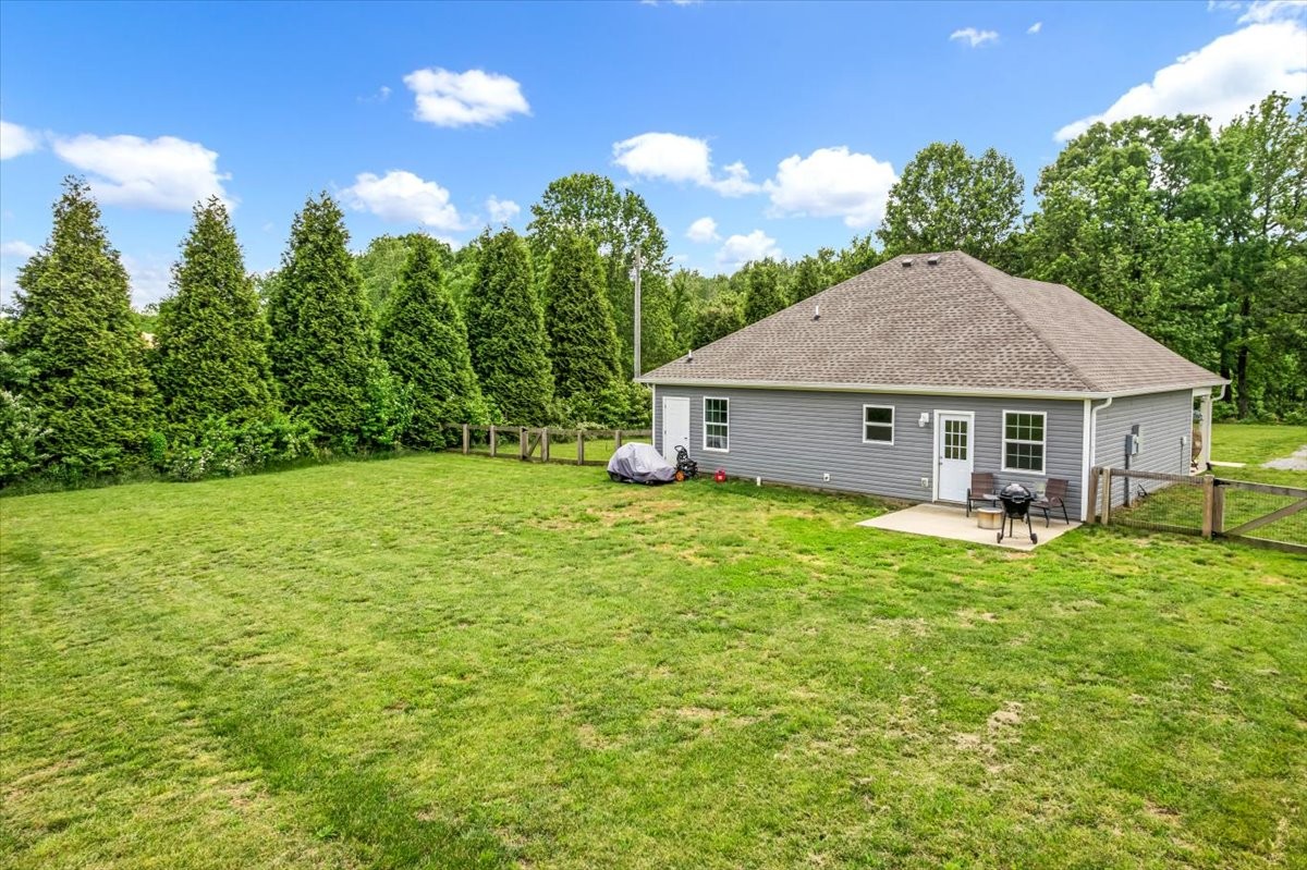147 Ray Jent Road Bethpage, TN 37022 - Photo 7 of 47 a front view of house with yard and trees