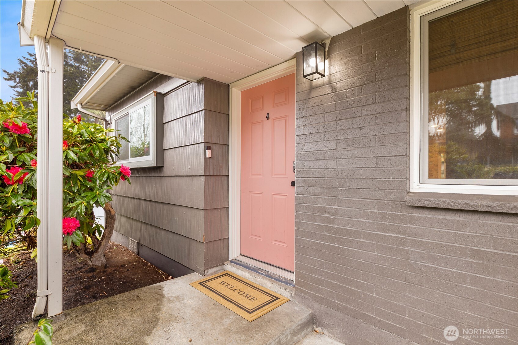 1259 North 173rd Street Shoreline, WA 98133 - Photo 2 of 37 a view of a door and chair in the house