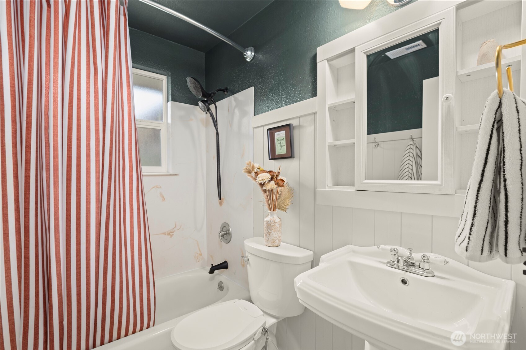 1259 North 173rd Street Shoreline, WA 98133 - Photo 23 of 37 a bathroom with a sink toilet and shower
